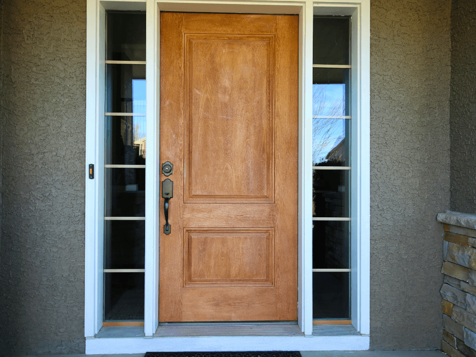 Entry door with glass sidelights